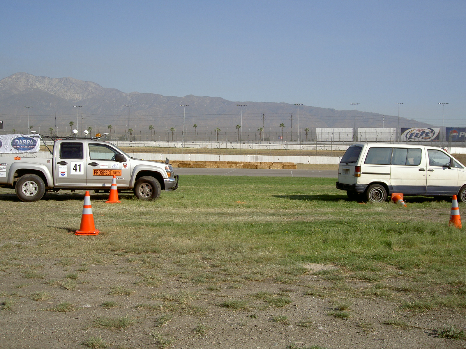 Prospect 11, Ford Pickup truck, at race site behind another van